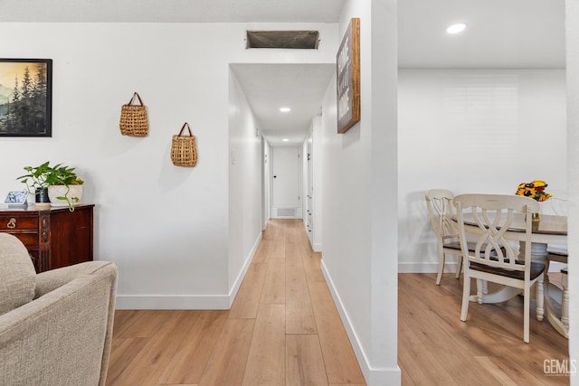 6101 Crestmore St, Bakersfield, CA 93308 - corridor featuring light wood-type flooring and recessed lighting