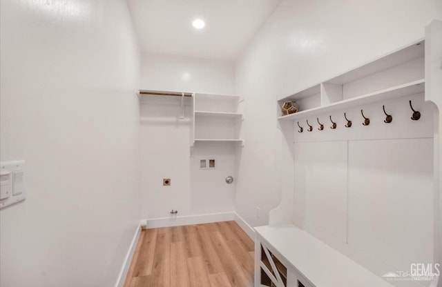 18671 Buckeye Pl, Tehachapi, CA 93561 - laundry room with gas dryer hookup, hookup for a washing machine, hookup for an electric dryer, light wood-type flooring, and recessed lighting