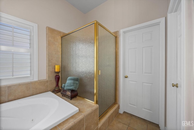 9005 Via Lugano, Bakersfield, CA 93312 - bathroom featuring a stall shower, a bath, and tile patterned flooring