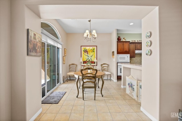 9005 Via Lugano, Bakersfield, CA 93312 - dining space featuring a chandelier, light tile patterned flooring, baseboards, and recessed lighting