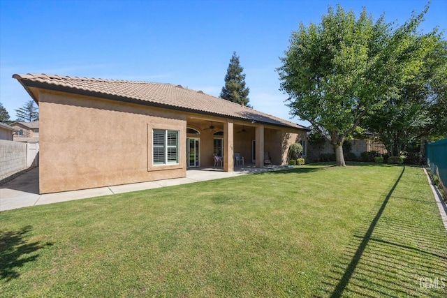 9005 Via Lugano, Bakersfield, CA 93312 - back of property featuring a ceiling fan, a patio area, and stucco siding