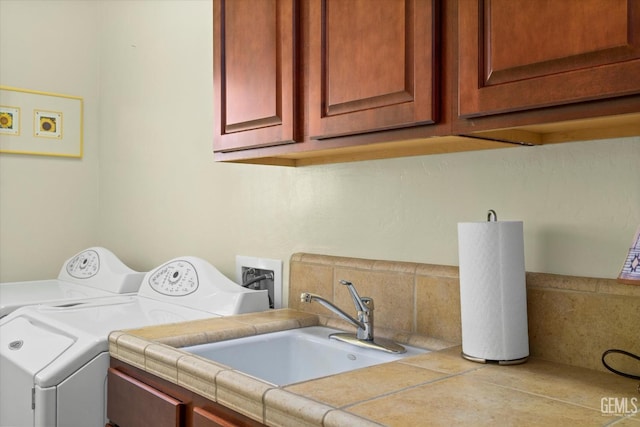 9005 Via Lugano, Bakersfield, CA 93312 - laundry area featuring cabinet space and washing machine and dryer