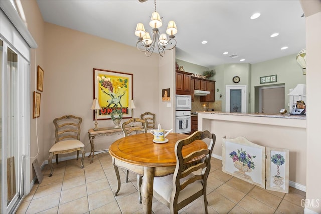 9005 Via Lugano, Bakersfield, CA 93312 - dining area featuring light tile patterned floors, a chandelier, recessed lighting, and baseboards