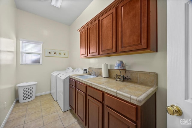 9005 Via Lugano, Bakersfield, CA 93312 - laundry area with washer and dryer, cabinet space, baseboards, and light tile patterned floors