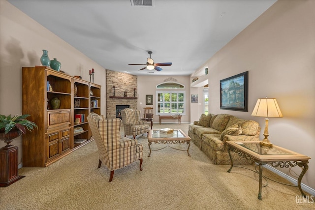 9005 Via Lugano, Bakersfield, CA 93312 - carpeted living area with a fireplace, ceiling fan, and baseboards