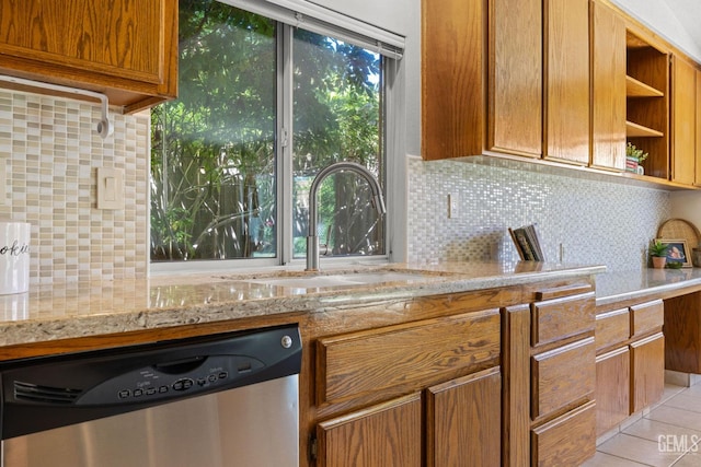 10400 Walnut Creek Ct, Bakersfield, CA 93311 - kitchen with stainless steel dishwasher, tasteful backsplash, open shelves, a sink, and light tile patterned flooring