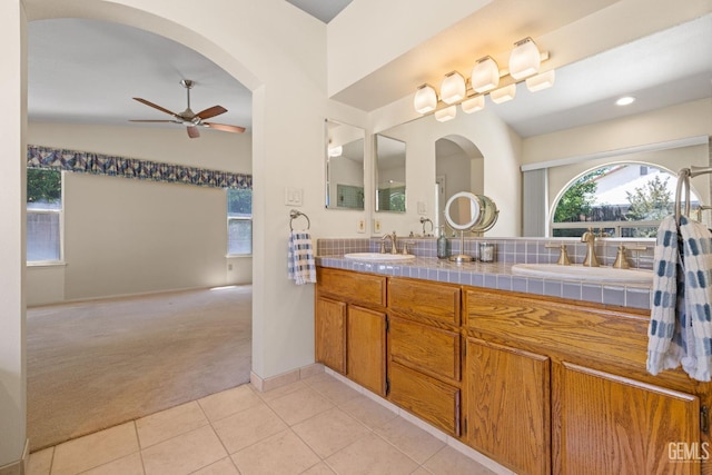 10400 Walnut Creek Ct, Bakersfield, CA 93311 - full bathroom with a ceiling fan, tile patterned flooring, double vanity, and baseboards