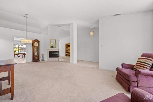 10400 Walnut Creek Ct, Bakersfield, CA 93311 - living area with light carpet and a tile fireplace