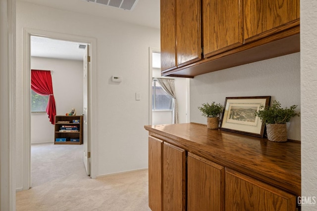10400 Walnut Creek Ct, Bakersfield, CA 93311 - hallway featuring light colored carpet and healthy amount of natural light