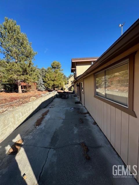 view of property exterior featuring a patio