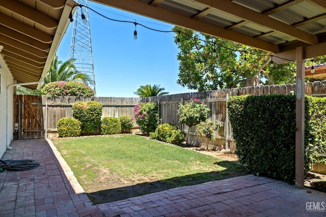 2924 Elm St, Bakersfield, CA 93301 - fenced backyard with a patio