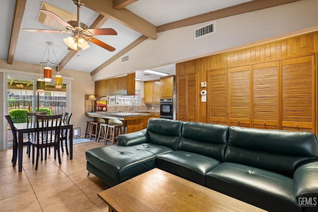 2924 Elm St, Bakersfield, CA 93301 - living room featuring a ceiling fan, light tile patterned flooring, and plenty of natural light