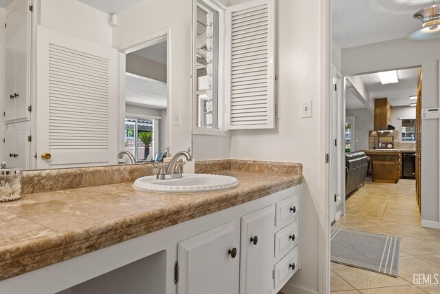 2924 Elm St, Bakersfield, CA 93301 - bathroom featuring tile patterned flooring and vanity