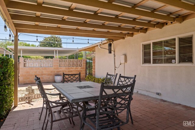 2924 Elm St, Bakersfield, CA 93301 - view of patio featuring outdoor dining area