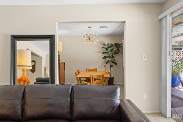 2924 Elm St, Bakersfield, CA 93301 - living room featuring a chandelier and carpet flooring