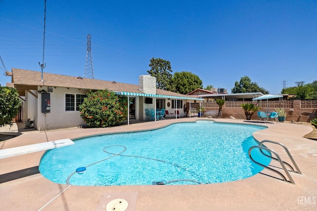 2924 Elm St, Bakersfield, CA 93301 - view of pool with a patio area and a diving board