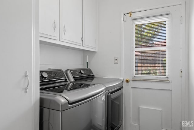 2924 Elm St, Bakersfield, CA 93301 - laundry area featuring cabinet space and independent washer and dryer