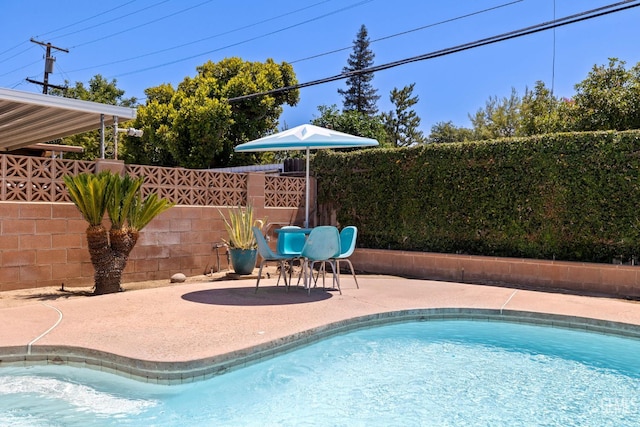 2924 Elm St, Bakersfield, CA 93301 - view of pool with a fenced backyard and a patio