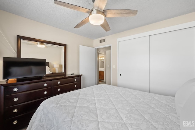 2924 Elm St, Bakersfield, CA 93301 - bedroom with a closet, ceiling fan, and a textured ceiling