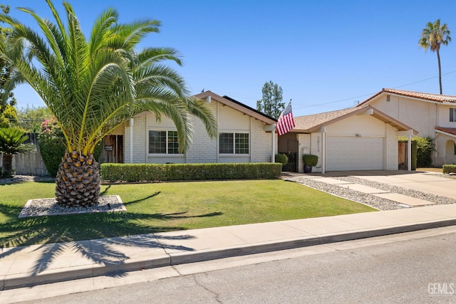 2924 Elm St, Bakersfield, CA 93301 - view of front of home with brick siding, a garage, concrete driveway, and stucco siding