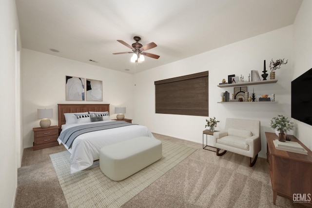 bedroom with ceiling fan and light colored carpet