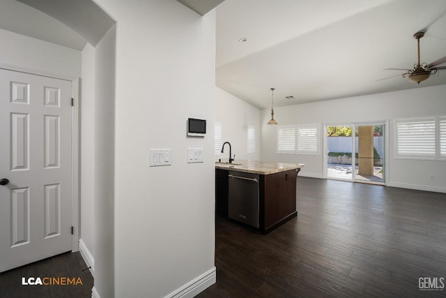 kitchen featuring sink, stainless steel dishwasher, dark hardwood / wood-style floors, pendant lighting, and ceiling fan