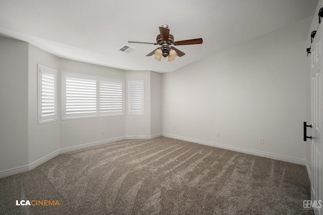 empty room featuring ceiling fan and carpet flooring