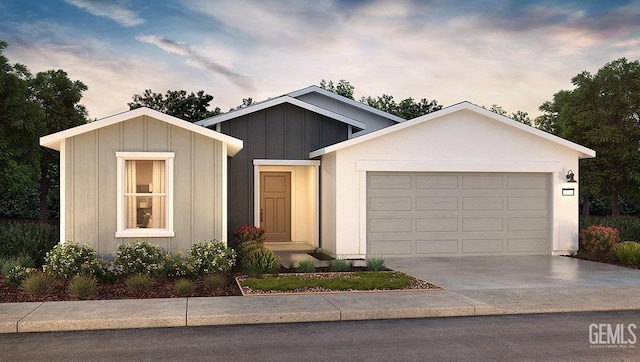 ranch-style house featuring a garage