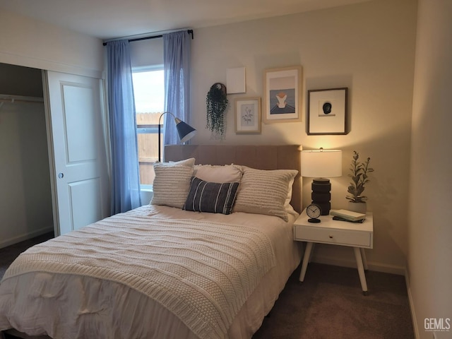 carpeted bedroom featuring a closet