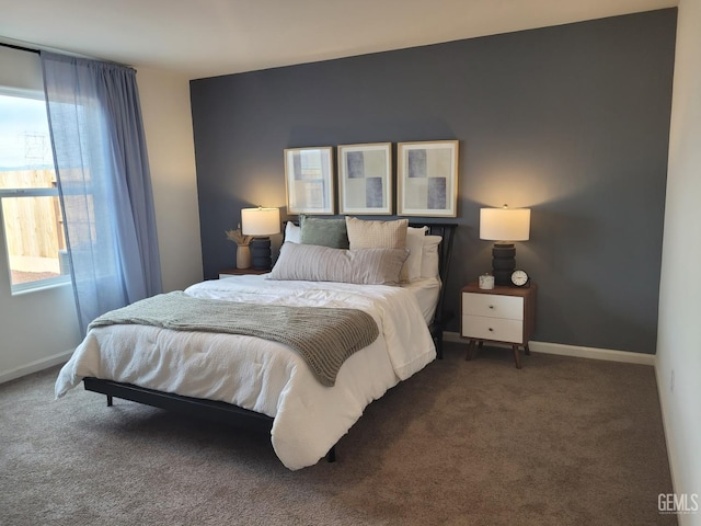 carpeted bedroom with multiple windows