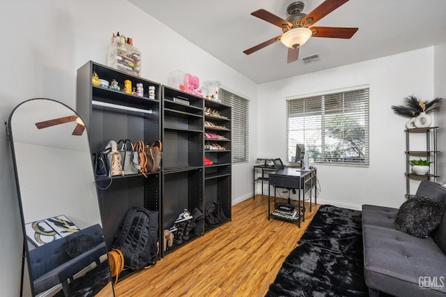 11011 Southwales Ct, Bakersfield, CA 93312 - home office with baseboards, visible vents, wood finished floors, and a ceiling fan