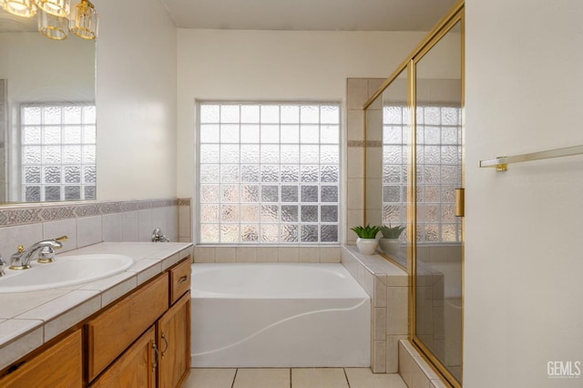 11011 Southwales Ct, Bakersfield, CA 93312 - bathroom featuring plenty of natural light, tile patterned flooring, and vanity