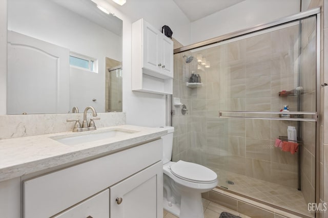 11011 Southwales Ct, Bakersfield, CA 93312 - full bath with vanity, toilet, and a shower stall