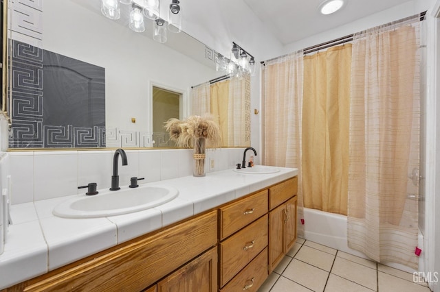 11011 Southwales Ct, Bakersfield, CA 93312 - full bath with double vanity, shower / bath combination with curtain, tile patterned flooring, and a sink