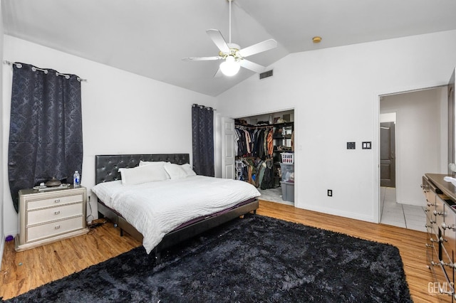 11011 Southwales Ct, Bakersfield, CA 93312 - bedroom with a closet, visible vents, ceiling fan, wood finished floors, and lofted ceiling