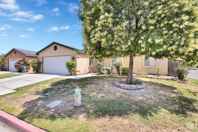 5403 Cascade Ridge St, Bakersfield, CA 93307 - view of front facade featuring concrete driveway, a garage, and stucco siding
