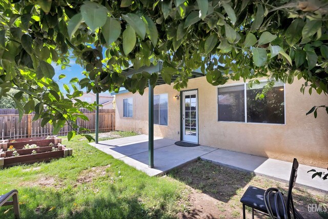 5403 Cascade Ridge St, Bakersfield, CA 93307 - view of yard featuring a patio area