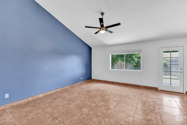 5403 Cascade Ridge St, Bakersfield, CA 93307 - spare room featuring a ceiling fan, vaulted ceiling, and tile patterned flooring