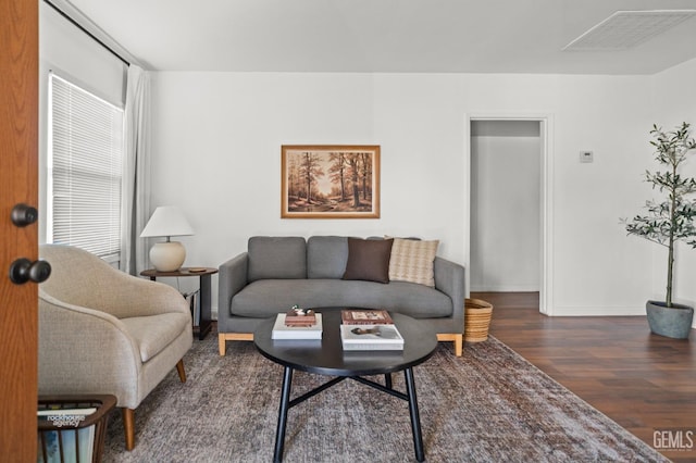 living room with dark wood-type flooring