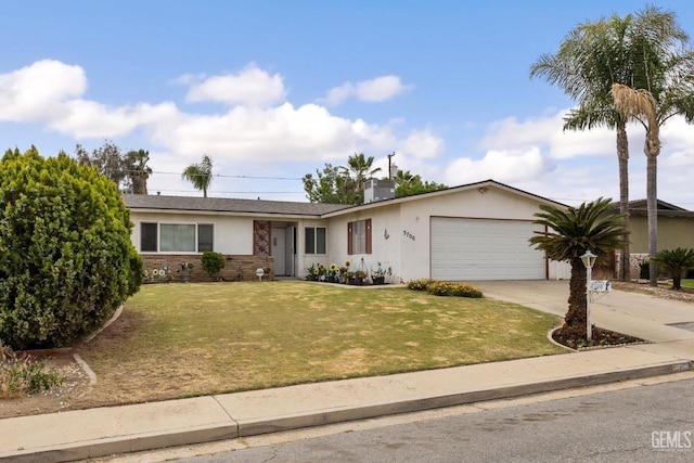 3700 Wenatchee Ave, Bakersfield, CA 93306 - ranch-style home with driveway, a front yard, a garage, stucco siding, and stone siding