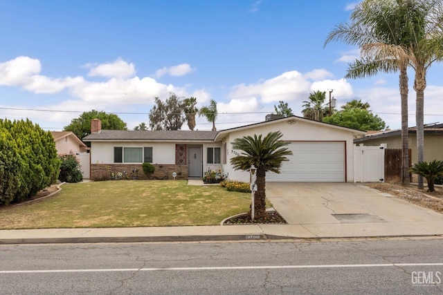 3700 Wenatchee Ave, Bakersfield, CA 93306 - single story home featuring an attached garage, stucco siding, fence, a front yard, and driveway