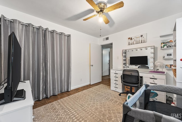 3700 Wenatchee Ave, Bakersfield, CA 93306 - home office featuring a ceiling fan, tile patterned flooring, visible vents, and baseboards