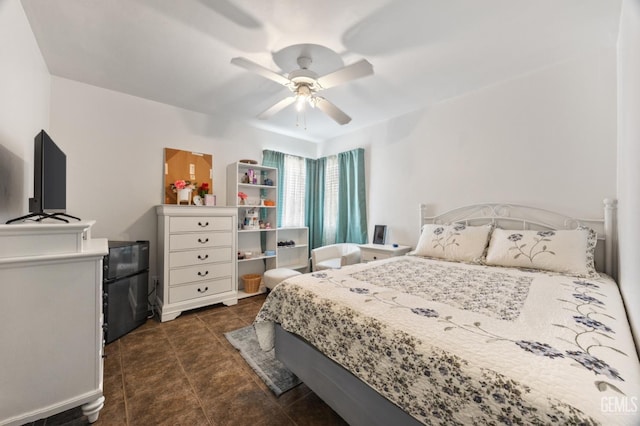 3700 Wenatchee Ave, Bakersfield, CA 93306 - bedroom featuring dark tile patterned flooring and ceiling fan