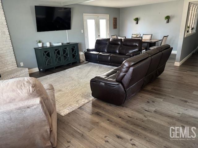 6109 Lupine Ave, Bakersfield, CA 93308 - living room featuring wood finished floors and baseboards