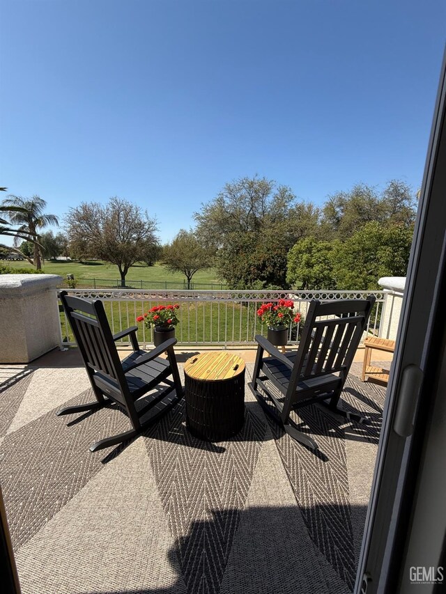 8628 Sandpines Dr, Bakersfield, CA 93312 - view of patio / terrace featuring a balcony