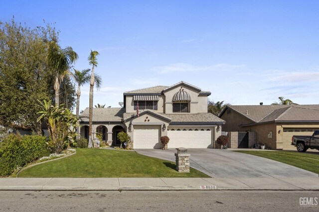 8628 Sandpines Dr, Bakersfield, CA 93312 - traditional-style home featuring stucco siding, driveway, a front yard, and an attached garage