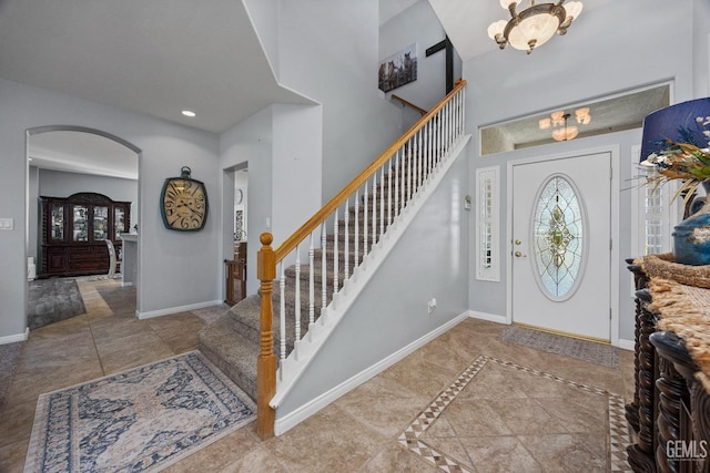 8628 Sandpines Dr, Bakersfield, CA 93312 - tiled foyer with baseboards, a chandelier, stairway, plenty of natural light, and recessed lighting