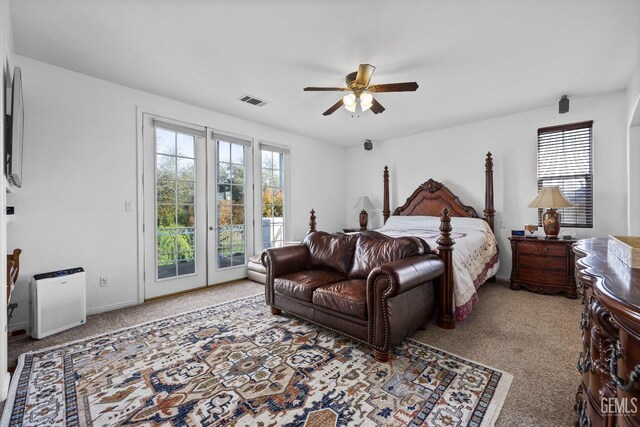 8628 Sandpines Dr, Bakersfield, CA 93312 - bedroom with access to exterior, multiple windows, and carpet flooring