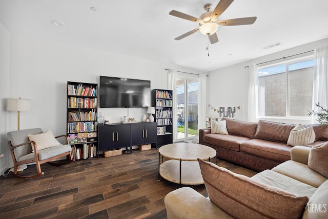 3116 Seymour St, Tulare, CA 93274 - living room with dark wood-style floors and a ceiling fan