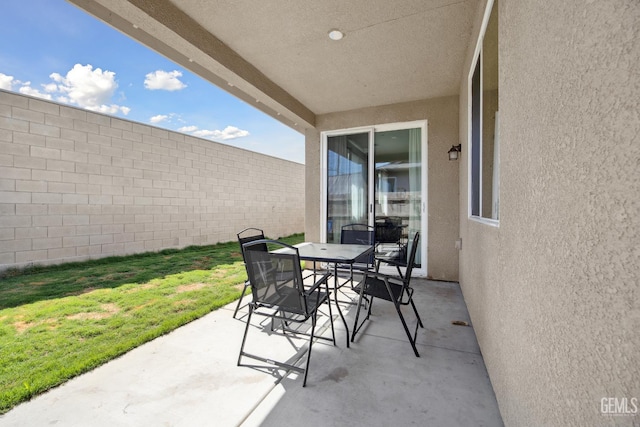 3116 Seymour St, Tulare, CA 93274 - view of patio with a fenced backyard and outdoor dining space